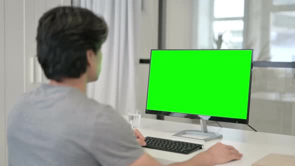 Businessman Using Desktop with Green Chroma Key Screen