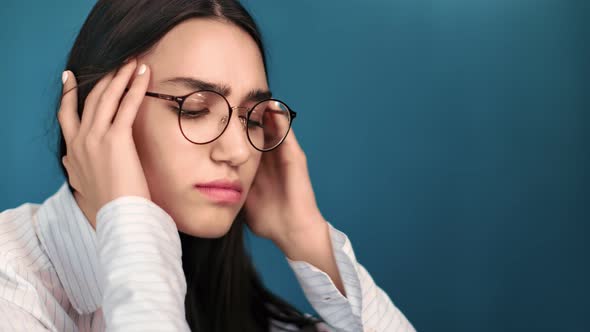 Unwell Girl Office Worker Suffering Migraine Touching Head