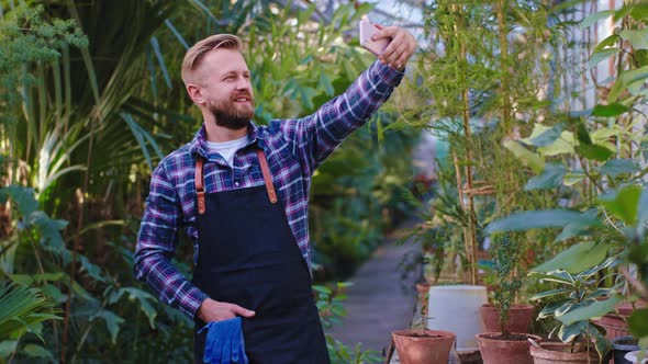 In Front of the Camera Gardener Man Take Some