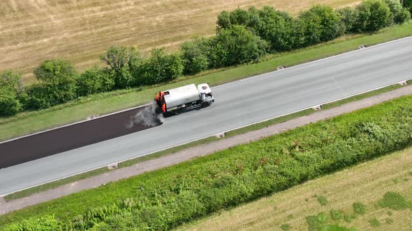 Road Resurfacing By Surface Dressing Process