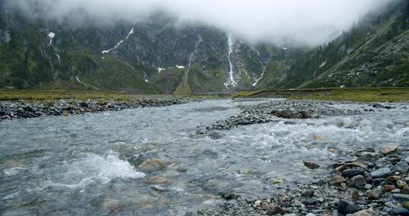 Mountain River and Sulzenau Waterfall in Fog in Background