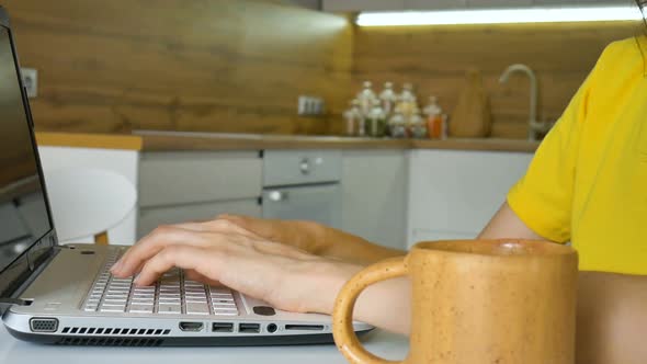 Young Woman Typing on Keyboard of Laptop Businesswoman Using Digital Tablet at Home Account Manager