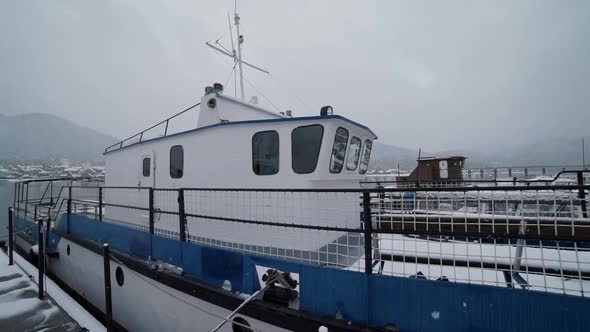 An Old Boat in a Cold Snow Environment