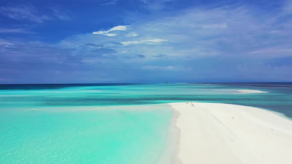 Aerial top down travel of paradise coast beach adventure by aqua blue ocean with white sandy backgro