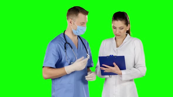 Surgeon Giving Instructions. Green Screen