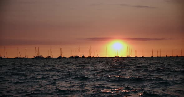 Sunset Dock Pier, Boats and Yachts Movement in Water in Sunset  Slow Motion