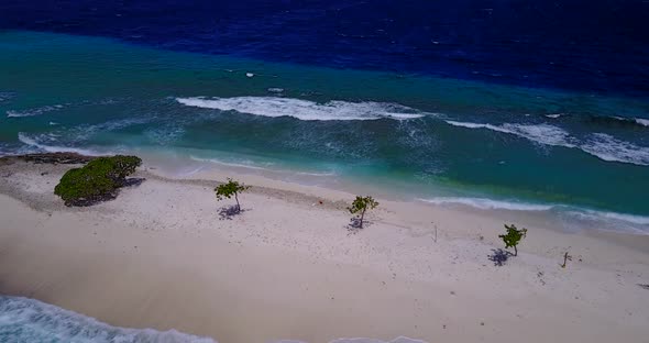 Beautiful flying island view of a white sandy paradise beach and aqua blue water background in hi re