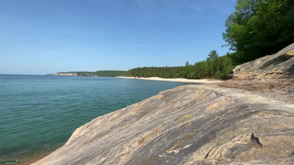 Pictured Rocks National Lakeshore Large Rock Formations Blue Sky Sunny Day On Lake Superior