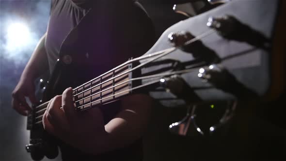 Top View. Grief and String Electric Bass Guitar,  Slow Motion