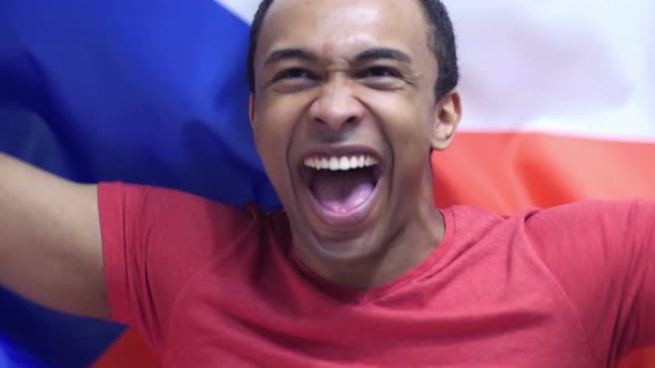 Czech Fan Celebrates Holding the Flag of Czech Republic