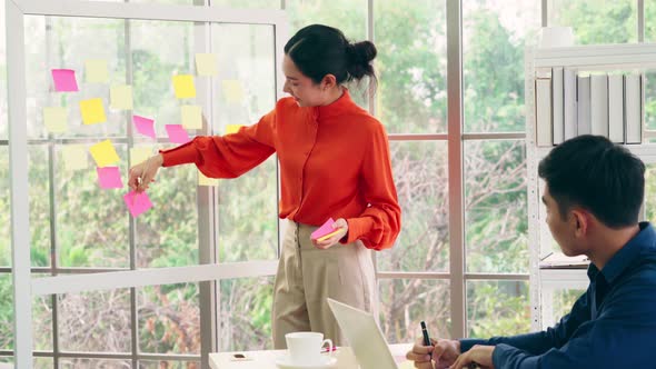 Business People Work on Project Planning Board