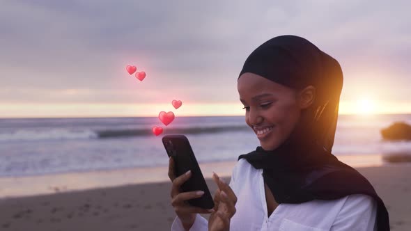 Somali-American woman checking her social media 