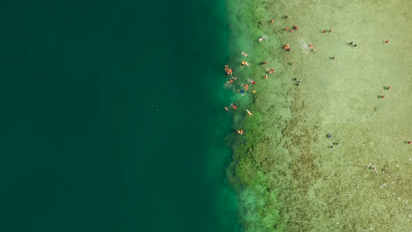 Tourists Snorkeling in the Lagoon Philippines El Nido