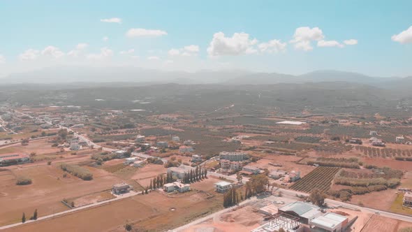 Drone panning over Greek city.