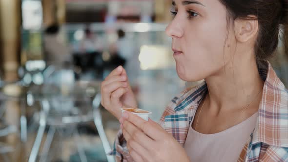 Woman Eating French Fries with Tomato Sauce, Unhealthy and Delicious Fast Food, Close-up.