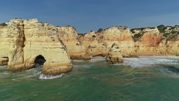 Aerial View on Rock and Waves in Algarve Portugal