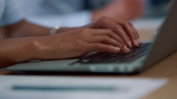 Businesswoman Hands Typing on Laptop