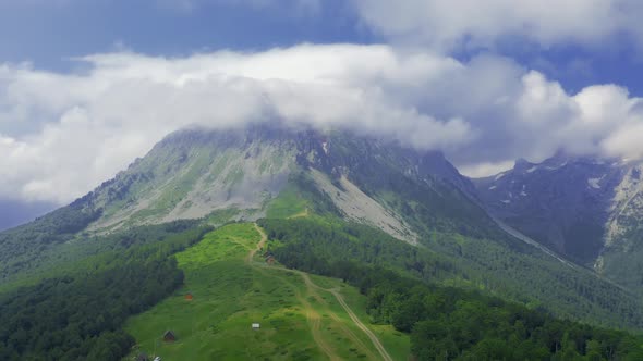 Amazing Mountain Landscape with Clouds Above Peak in Komovi Mountains Montenegro