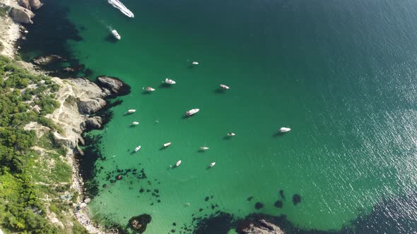 Aerial Panoramic View of Seascape with Crystal Clear Azure Sea and Rocky Shores