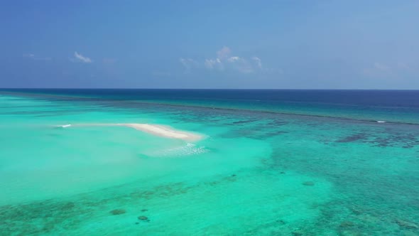 Aerial scenery of exotic coast beach holiday by turquoise sea with white sand background of a dayout