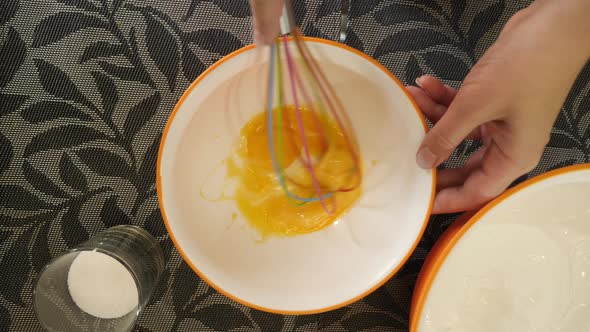 Whipping eggs with a whisk