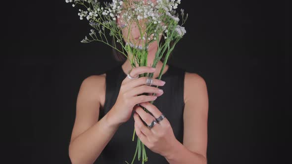 Portrait of Woman Modeling Rings