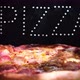 Delicious Fresh Italian Pizza On A Black  Background With The Effect Of Light Inscription Pizza - VideoHive Item for Sale