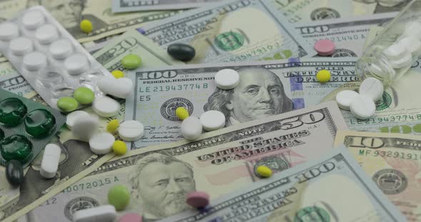 Pills Falling on Dollar Banknotes, Expensive Medication, Pharmaceutical Business