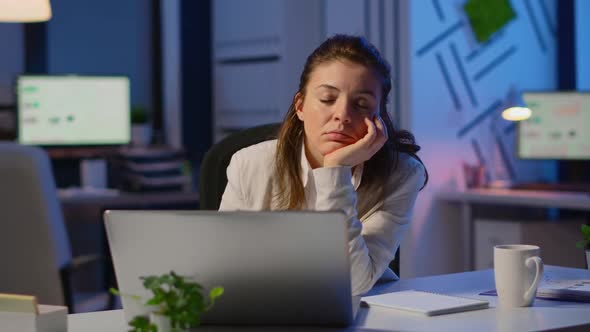 Tired Remote Woman Napping on Chair Waking Up Working on Laptop