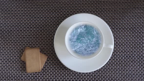 Sea Waves in a Cup