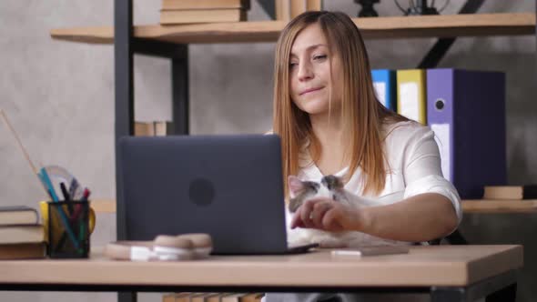 Portrait of Female Working on Computer in Office