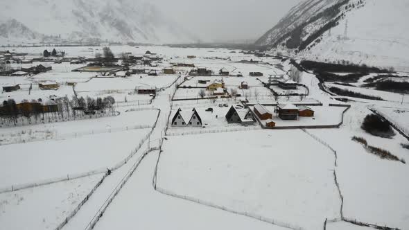 Drone Motion of Snowy Mountains Village