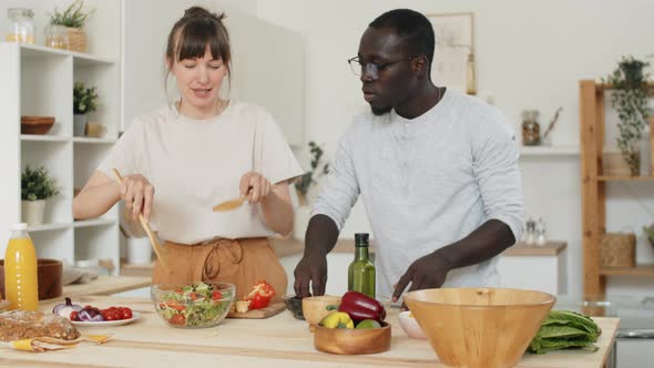 Multiethnic Family Couple Cooking Dinner Together