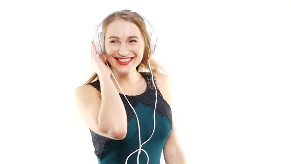 Beauty Woman Listening Music in Headphone