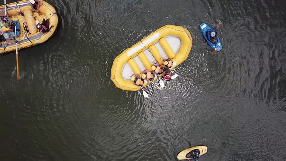 Yellow rafting boat capsizing at Jinja on the Nile River in Uganda. Drone top view. 4k
