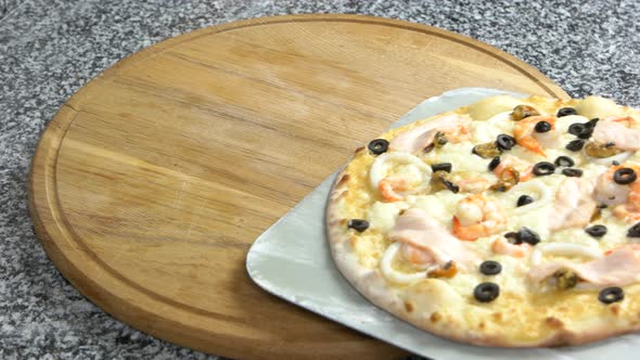 Seafood Pizza on Wooden Board