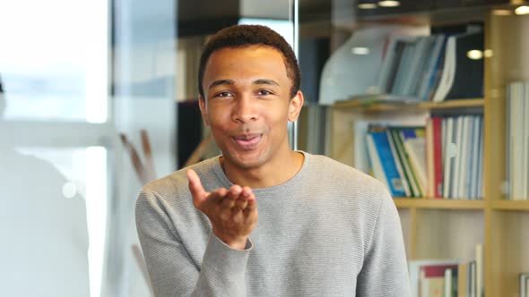 Flying Kiss by Young Afro-American Man, Portrait