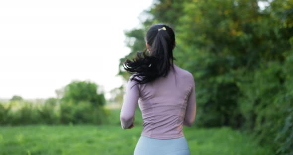 Asian young woman running