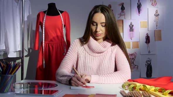Fashion Designer Draws a Sketch of a Red Dress, Workshop