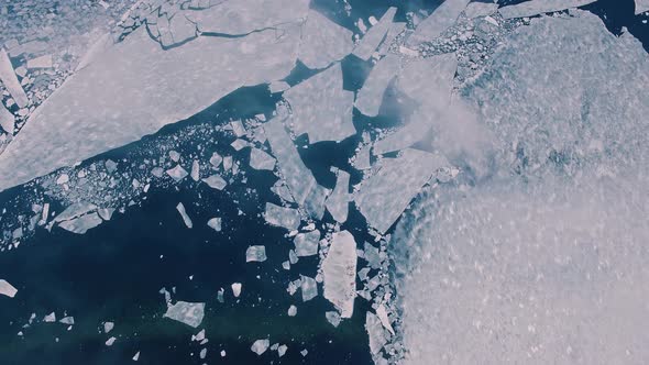 Drone View of Ice Floes in the Sea Bay and City View