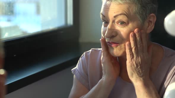 Closeup Portrait of a Grayhaired Elderly Womanskin Care and Make Up