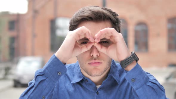 Handmade Binocular by Young Man Searching New Chance