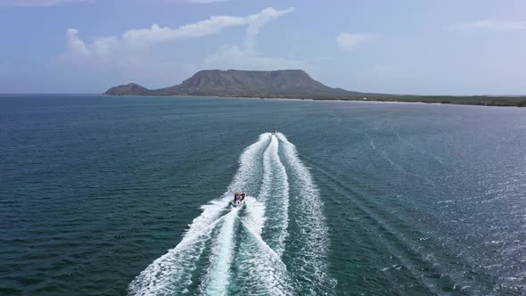 Boats during sightseeing, Monte Cristi National Park, Dominican Republic. Aerial forward