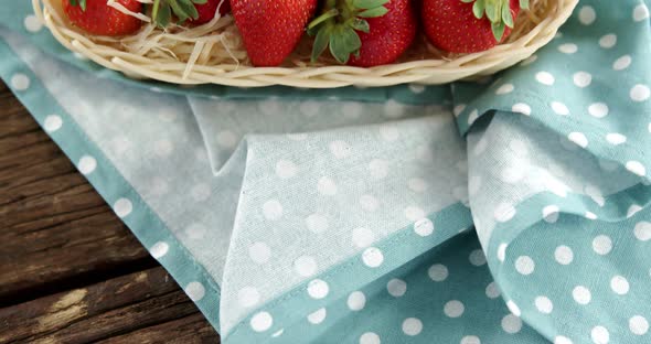 Fresh strawberries in wicker tray