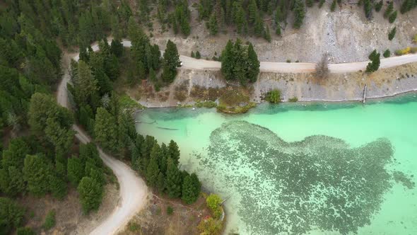 Flying along the shoreline of Cliff Lake viewing the aqua colored water