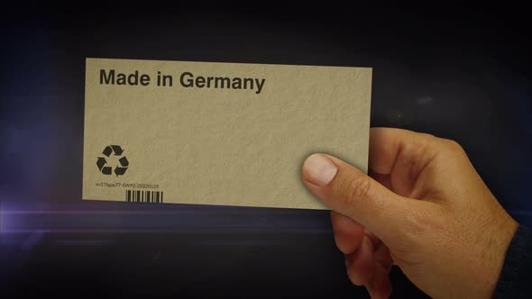 Made in Germany box pack in hand abstract concept rendering