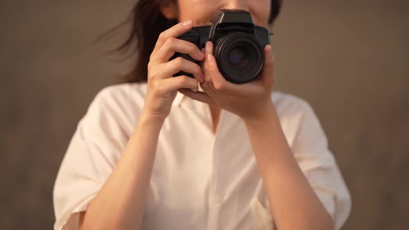 woman taking pictures