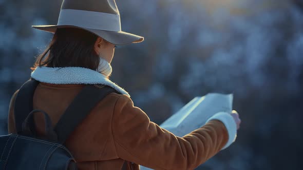 Attractive girl with a map