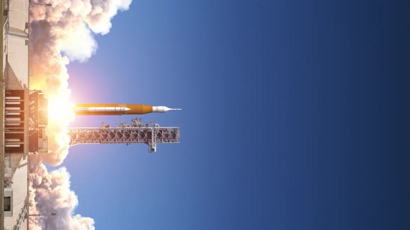 Vertical video of big heavy rocket launch alt
