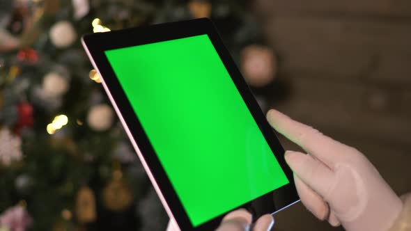 Santa Choose Gifts on TabletPC. Tablet with Green Screen